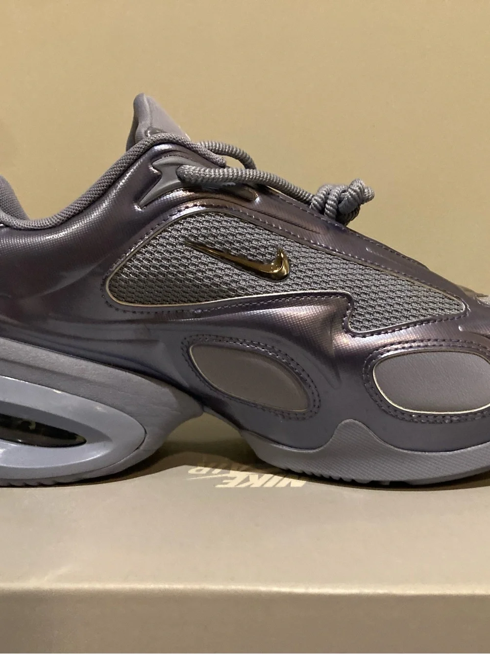 Nike Women’s Metallic Silver and Grey Runner Sneakers